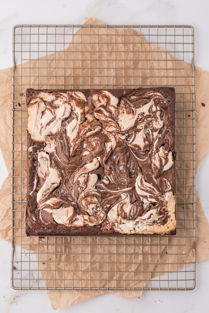 The nutella fluff brownies cooling on a cooling rack.