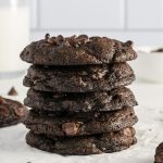 A stack of five Chewy Double Chocolate Chip Cookies.