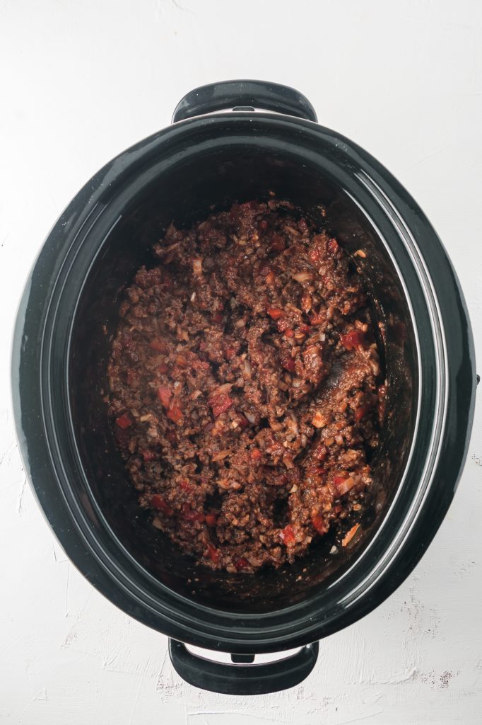 Cooked sloppy joe mixture the bottom of a slow cooker.