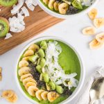 A Tropical Green Smoothie Bowl with all its toppings.