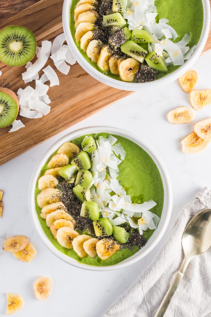 A Tropical Green Smoothie Bowl with all its toppings.