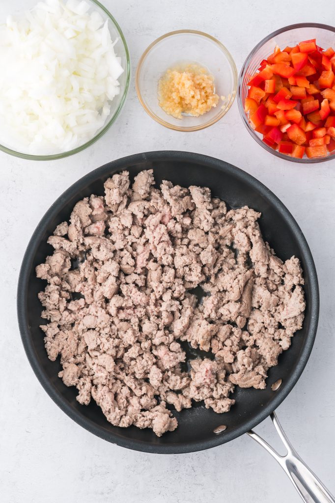 A pan of cooked ground meat in a pan.