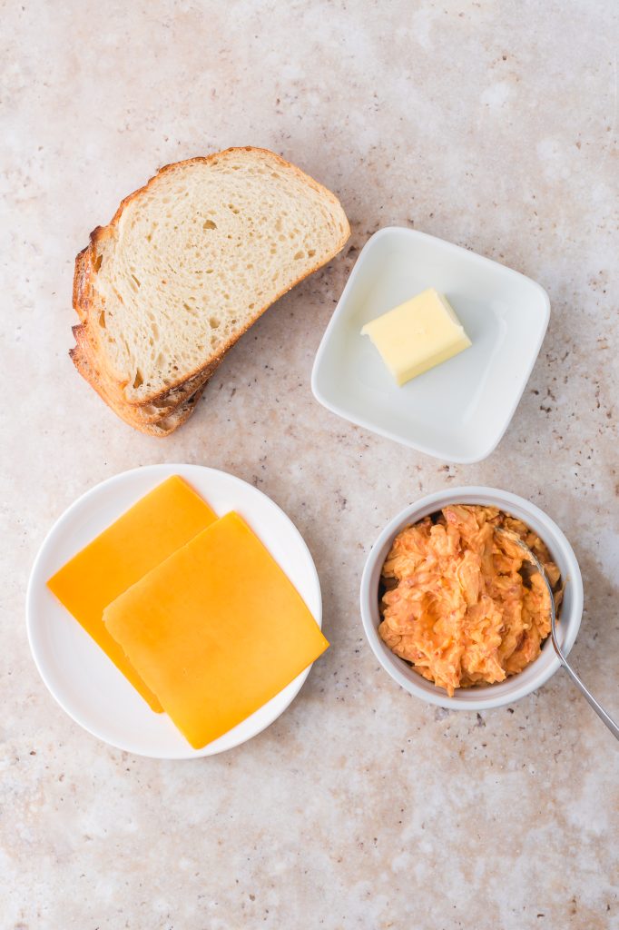 A mis-en-place of ingredients for a Pimento Grilled Cheese Sandwich.