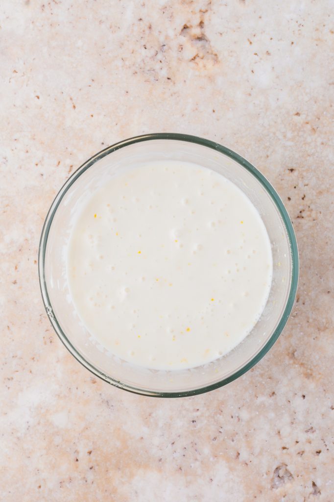 The completed Honey Lemon Yogurt sauce in a glass bowl.