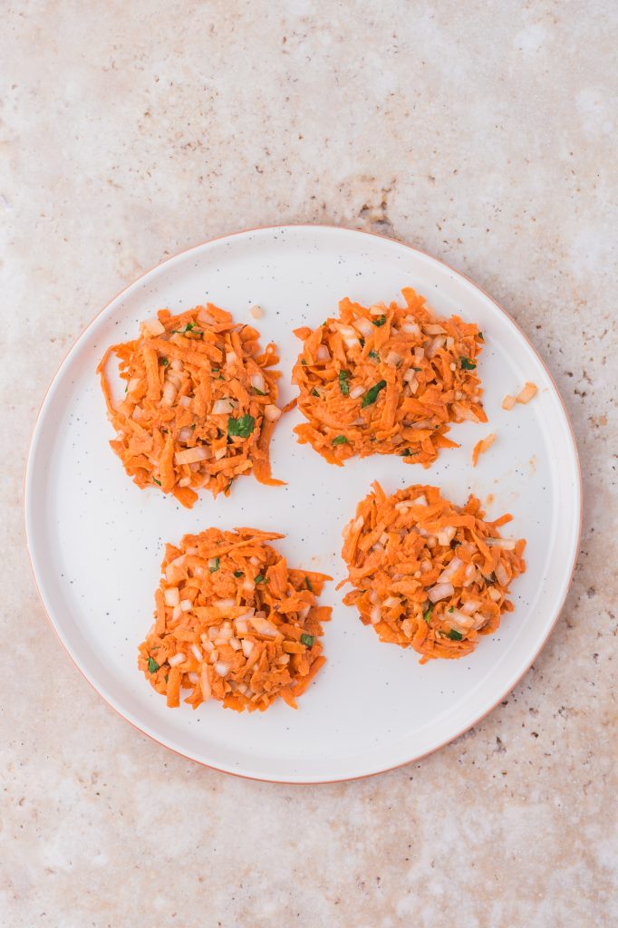 Four raw Sweet Potato Fritters.