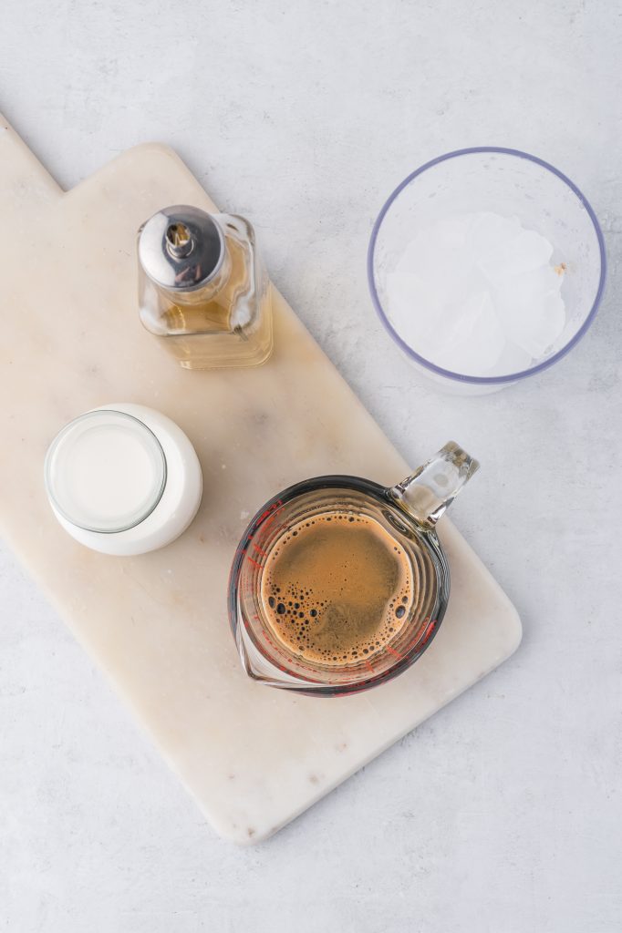 A mis-en-place of the ingredients for Double Shot Iced Shaken Espresso.