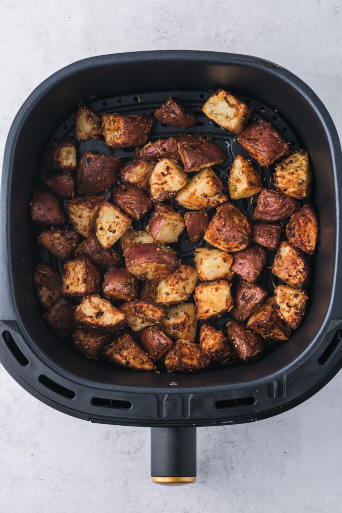 The Air Fryer Red Potatoes in the air fryer basket.