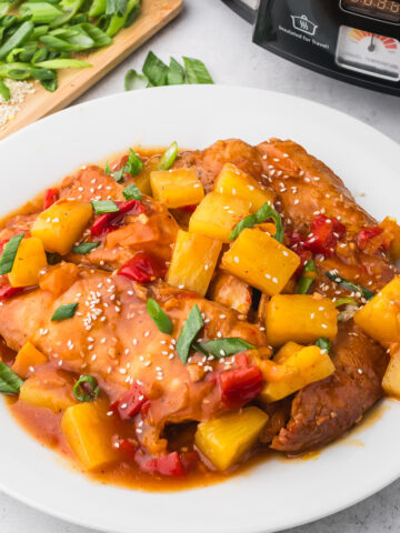 A white bowl of Slow Cooker Hawaiian Chicken.