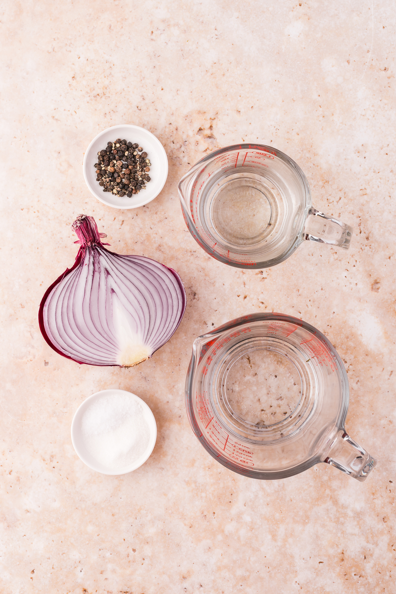 A mis-en-place of ingredients for Pickled Red Onions.