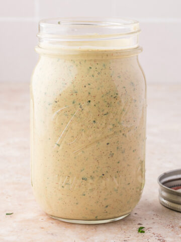 A mason jar of Smoky Poblano Ranch Dressing.