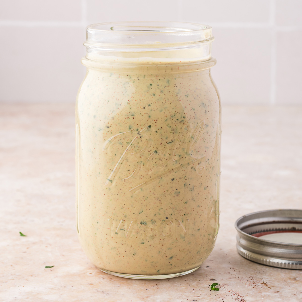 A mason jar of Smoky Poblano Ranch Dressing.