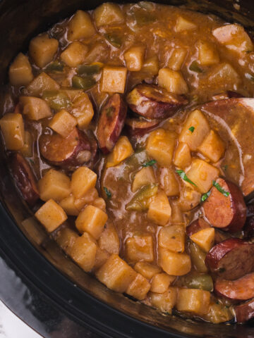 A pot of Slow Cooker Sausage Potato Casserole.