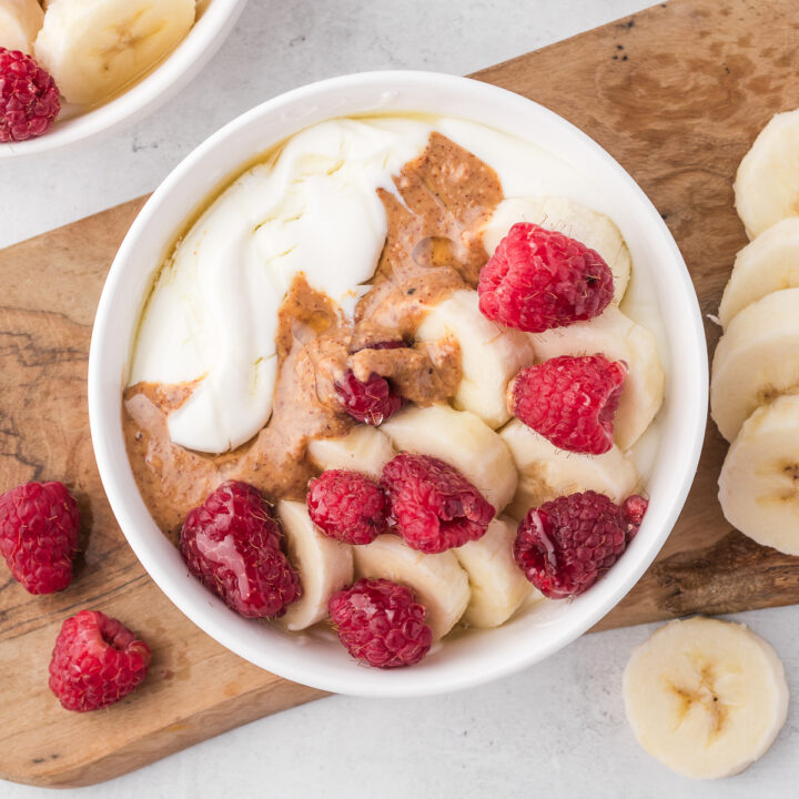 Whipped Cottage Cheese Bowls with raspberries, bananas, and almond butter.