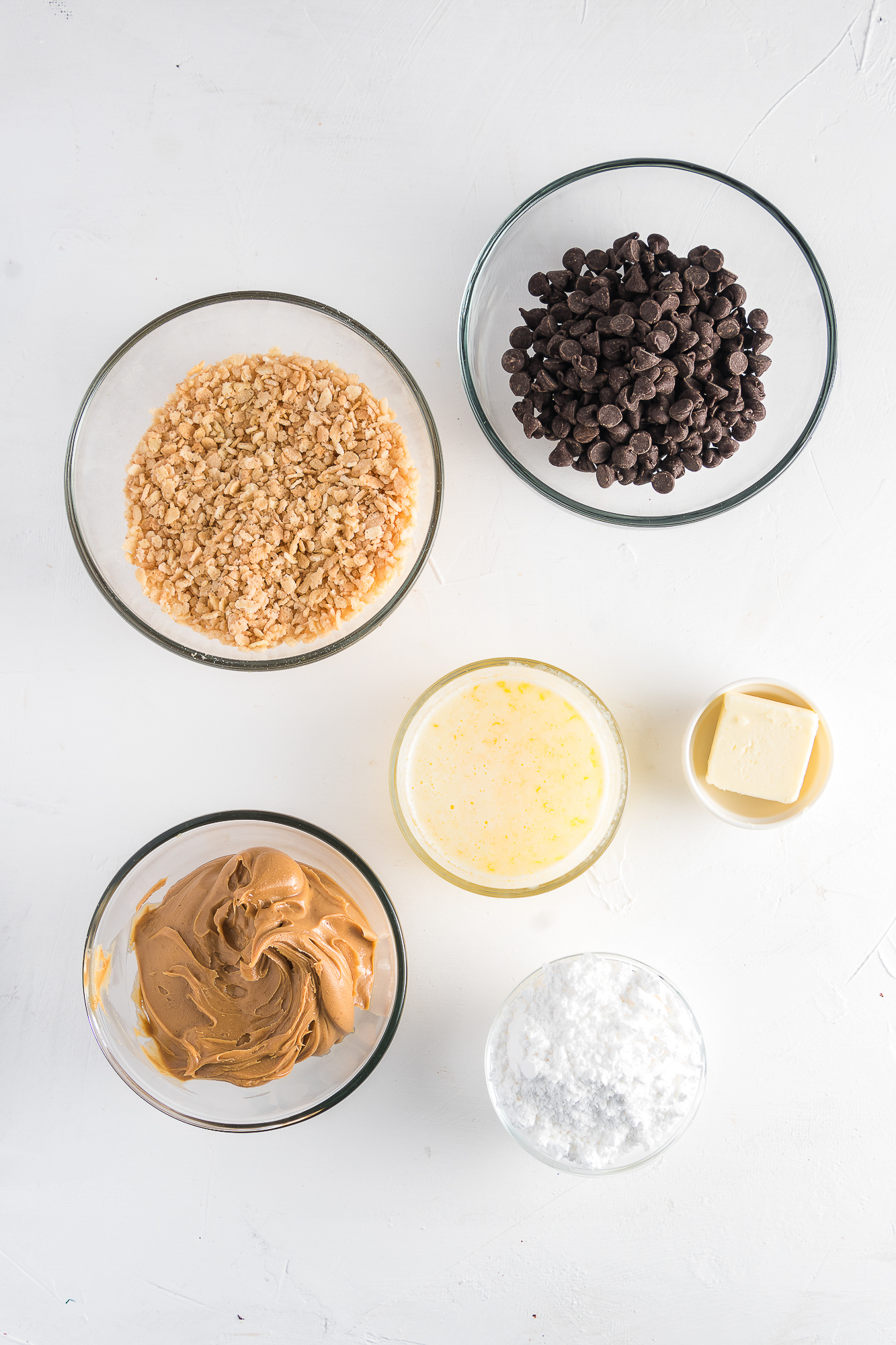 A mis-en-place of ingredients for Crispy Peanut Butter Chocolate Bars.