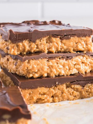 A stack of three Crispy Peanut Butter Chocolate Bars.