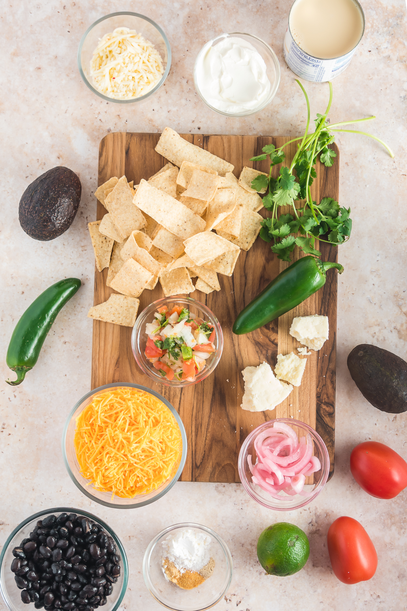 A mis-en-place of ingredients for Sheet Pan Nachos.