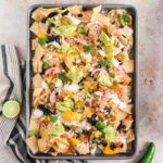 A baking sheet of Sheet Pan Nachos.