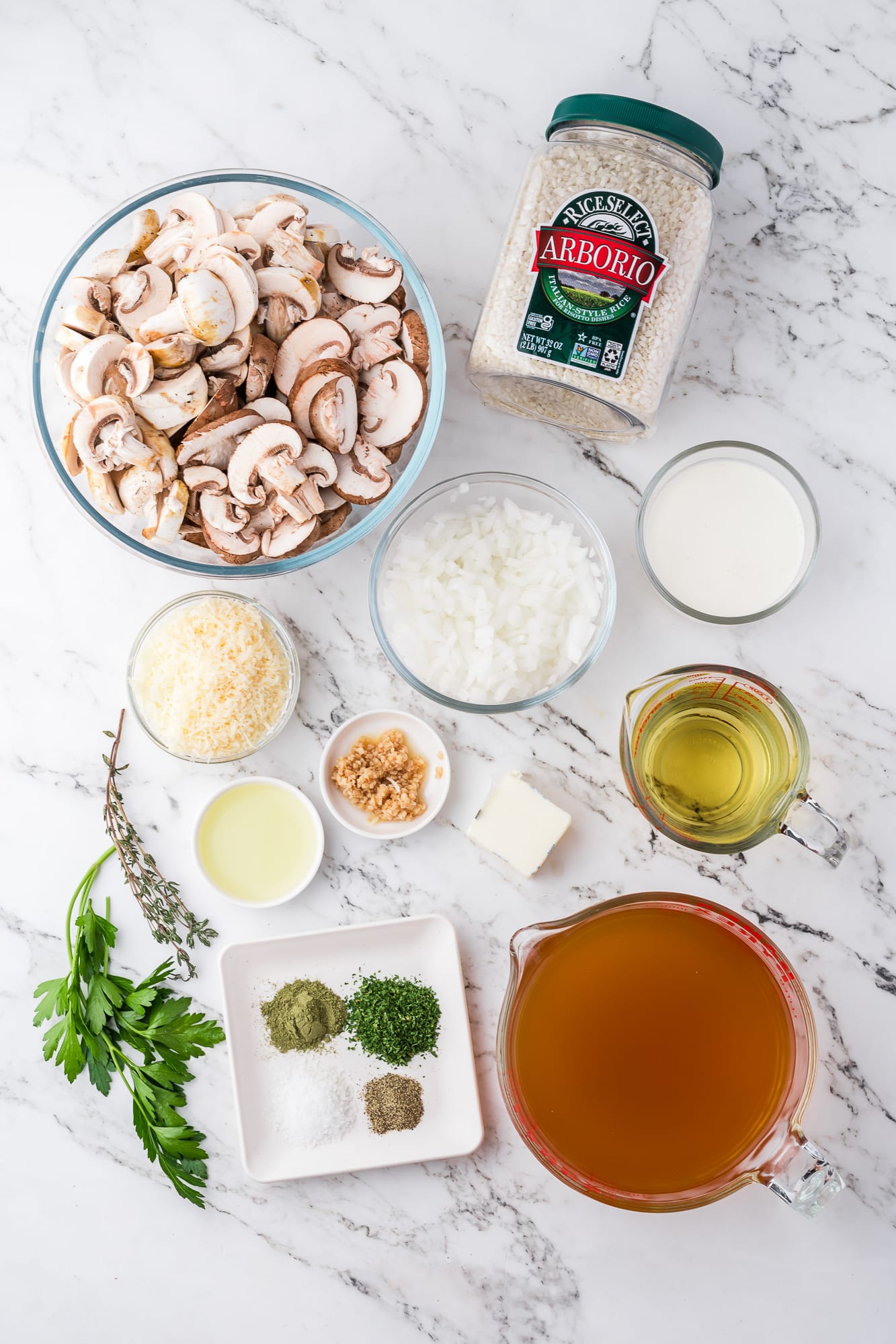 A mis-en-place of ingredients for Slow Cooker Mushroom Risotto.