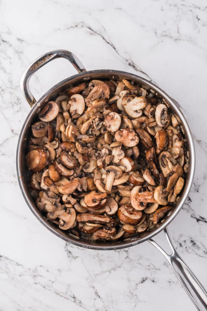 Sliced mushroom in a pot.