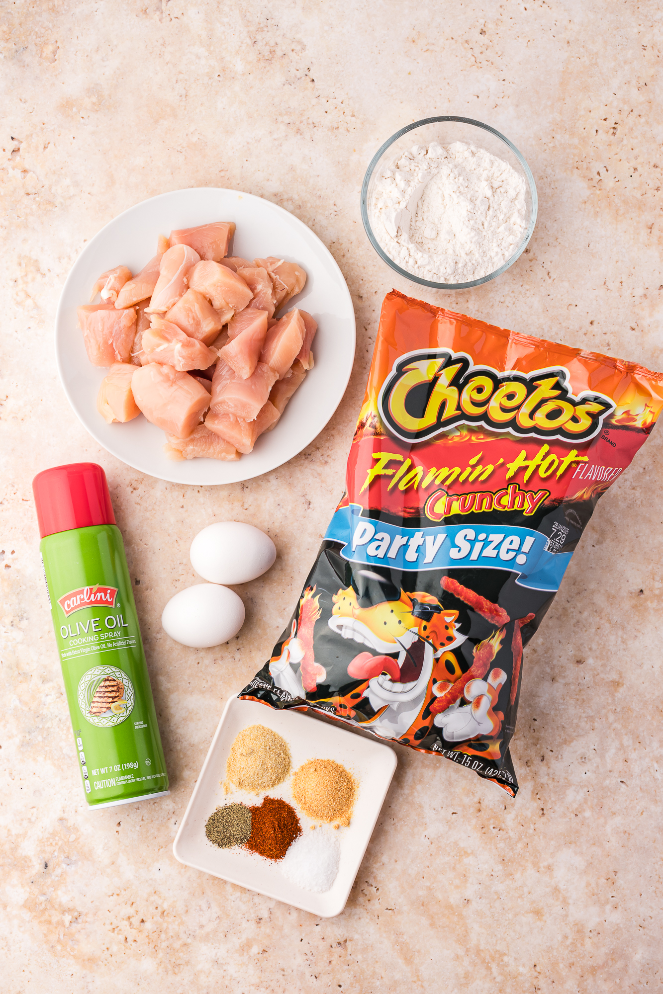 A mis-en-place of ingredients for Air Fryer Flamin' Hot Cheetos Nuggets.