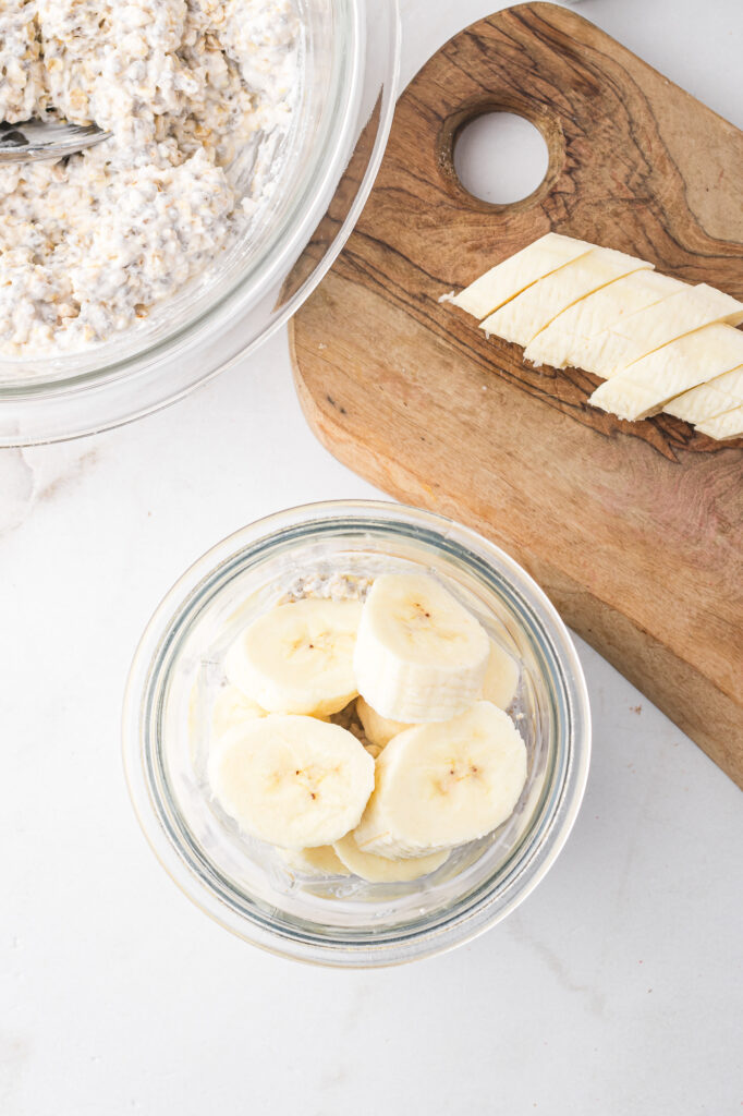 The overnight oat mixture topped with sliced banana.