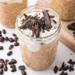 Coffee Overnight Oats in a glass jar.