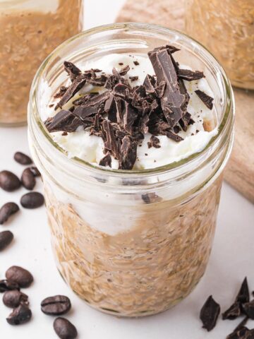 Coffee Overnight Oats in a glass jar.