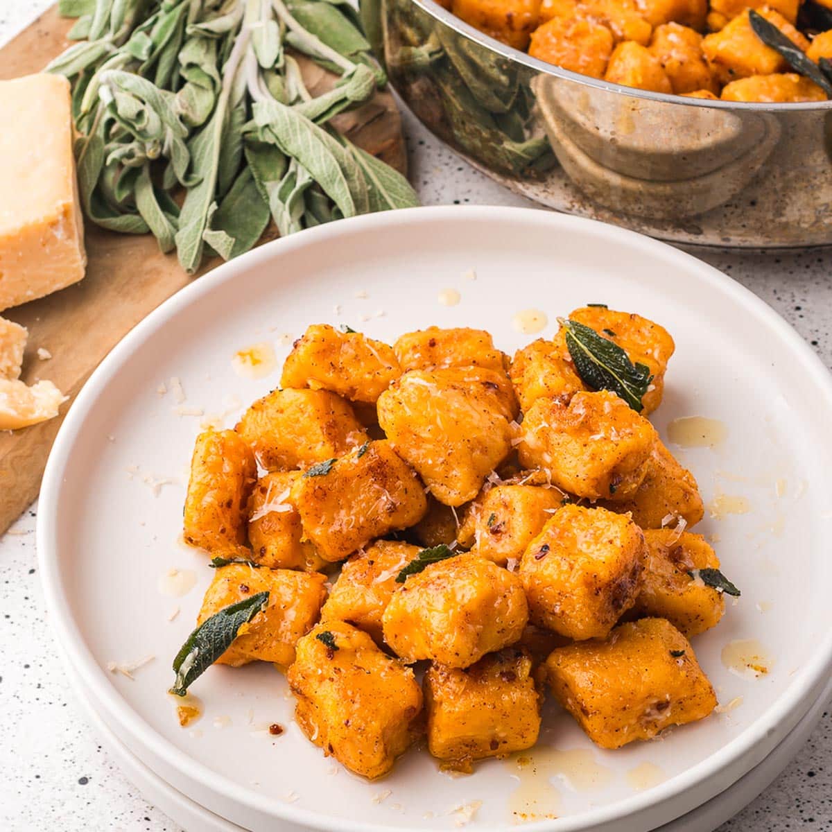 A plate of Sweet Potato Gnocchi with Sage Brown Butter Sauce.