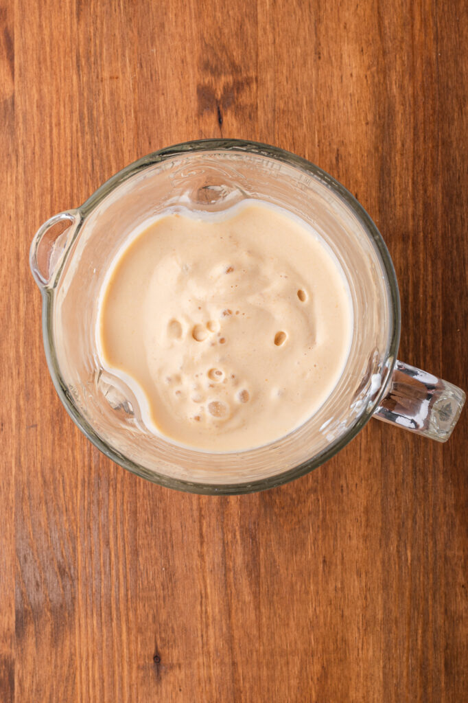 A blended Cottage Cheese Fruit Smoothie in the blender top view