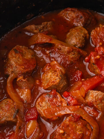 A close up of Slow Cooker Sausage and Peppers in the slow cooker