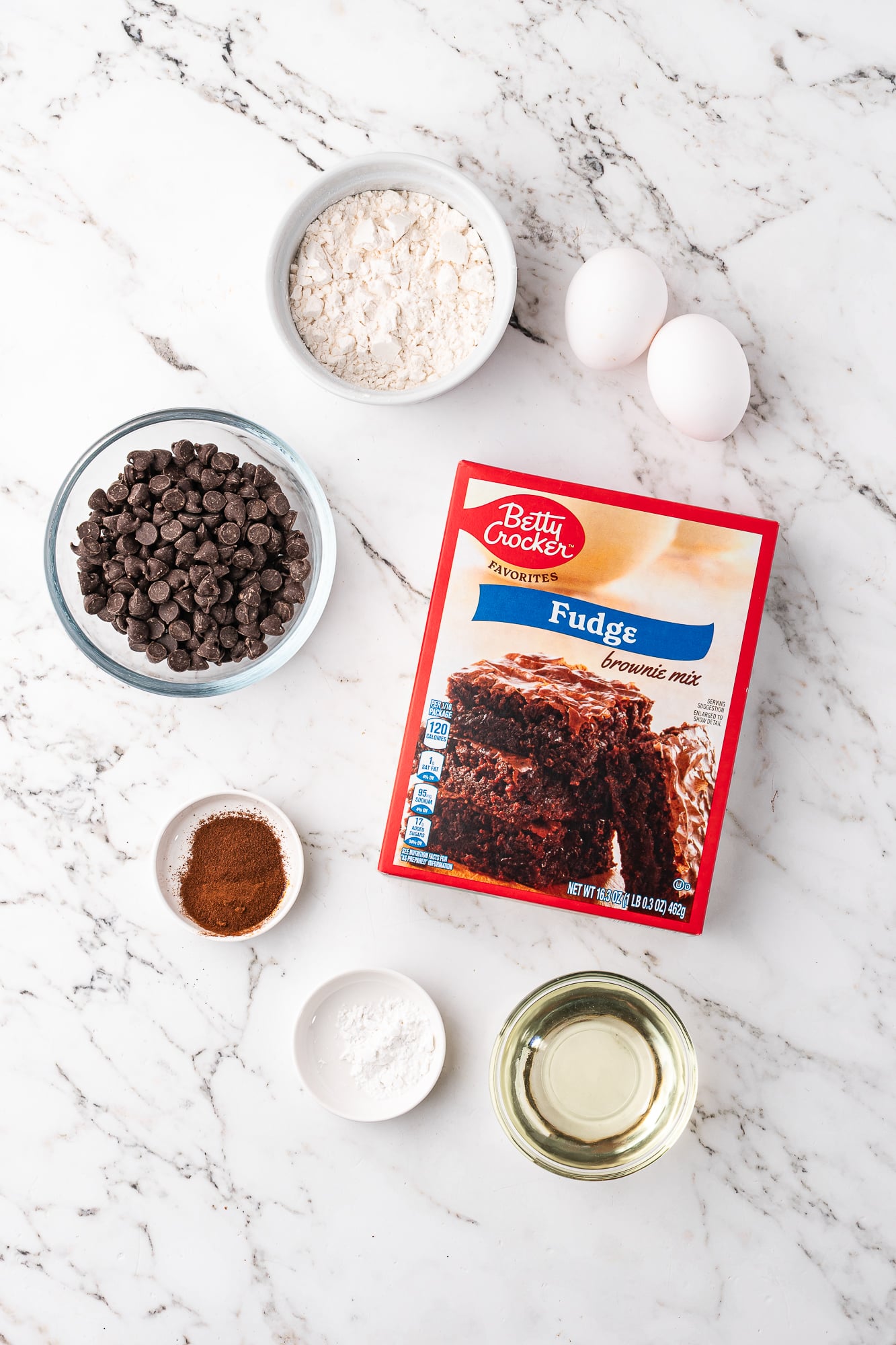 A mis-en-place of ingredients for Easy Brownie Mix Cookies