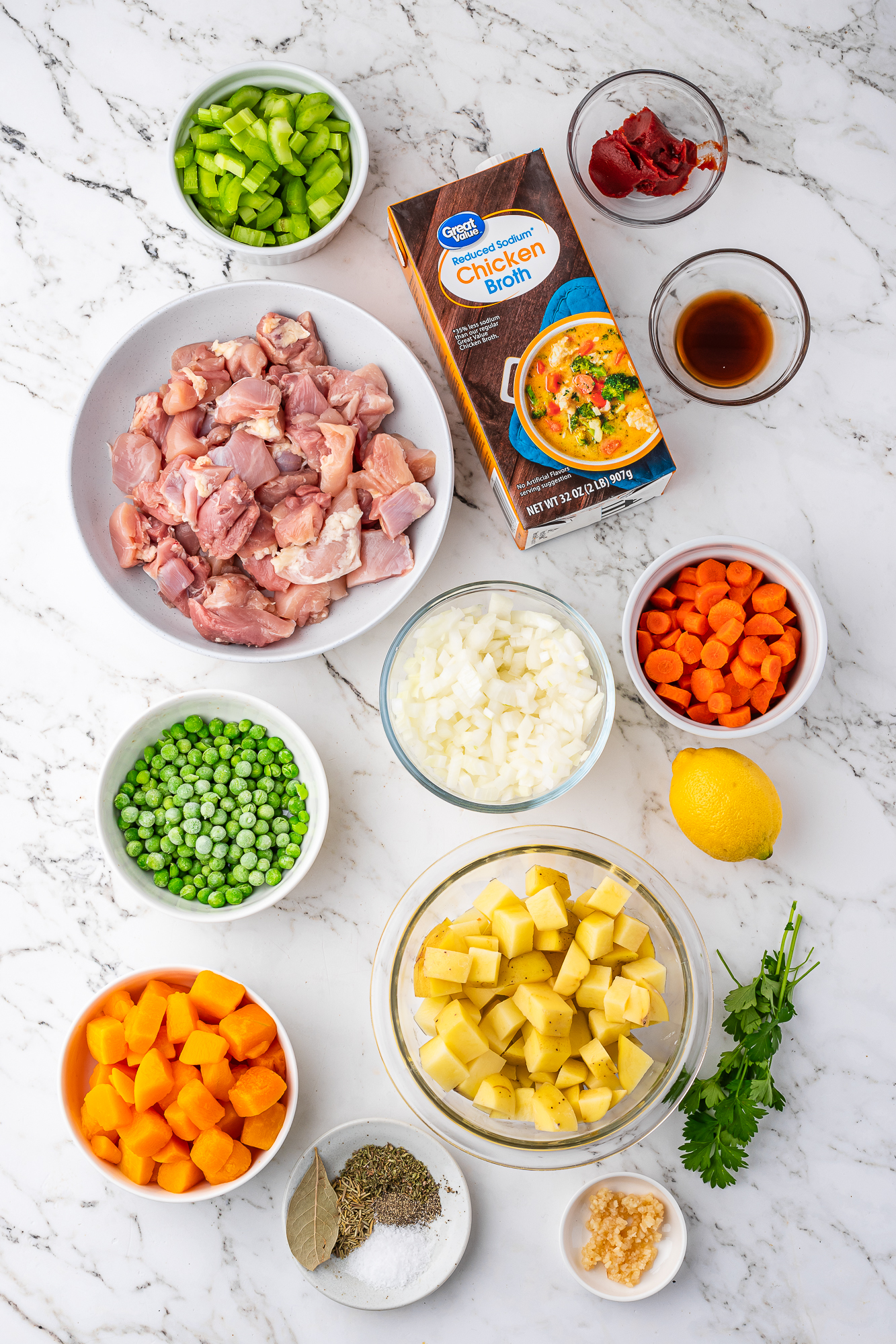 A mis-en-place of ingredients for Slow Cooker Hearty Chicken Stew