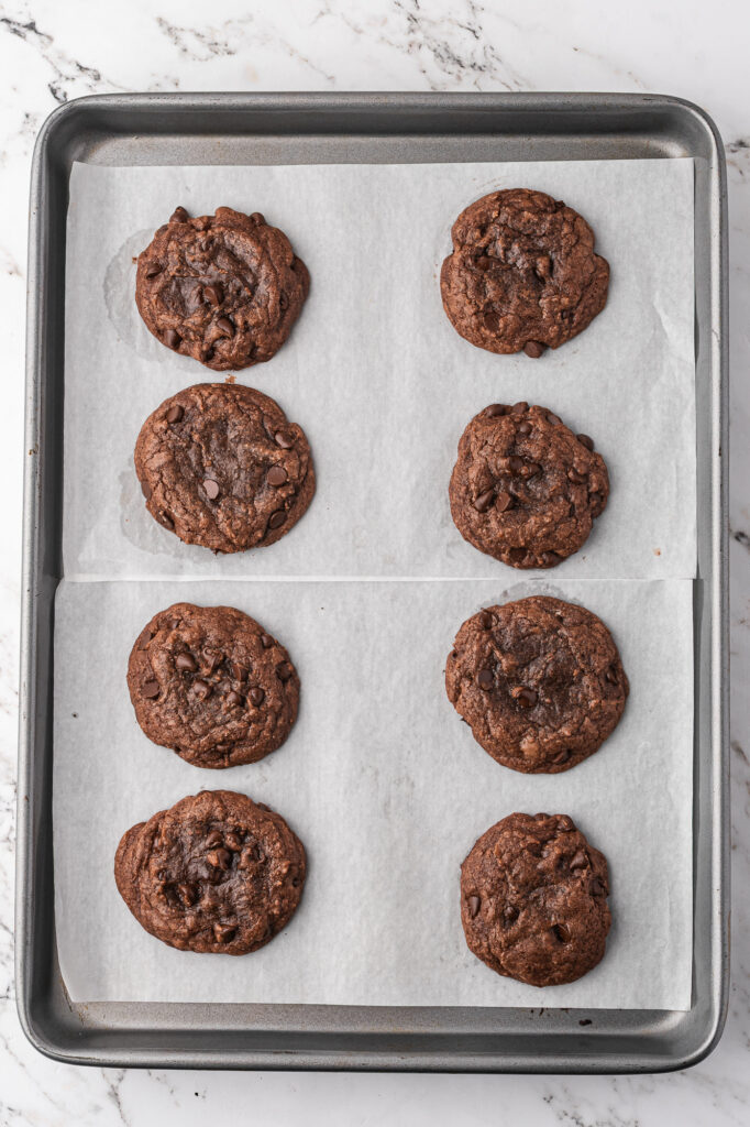 A parchment-lined baking sheet with 8 Easy Brownie Mix Cookies