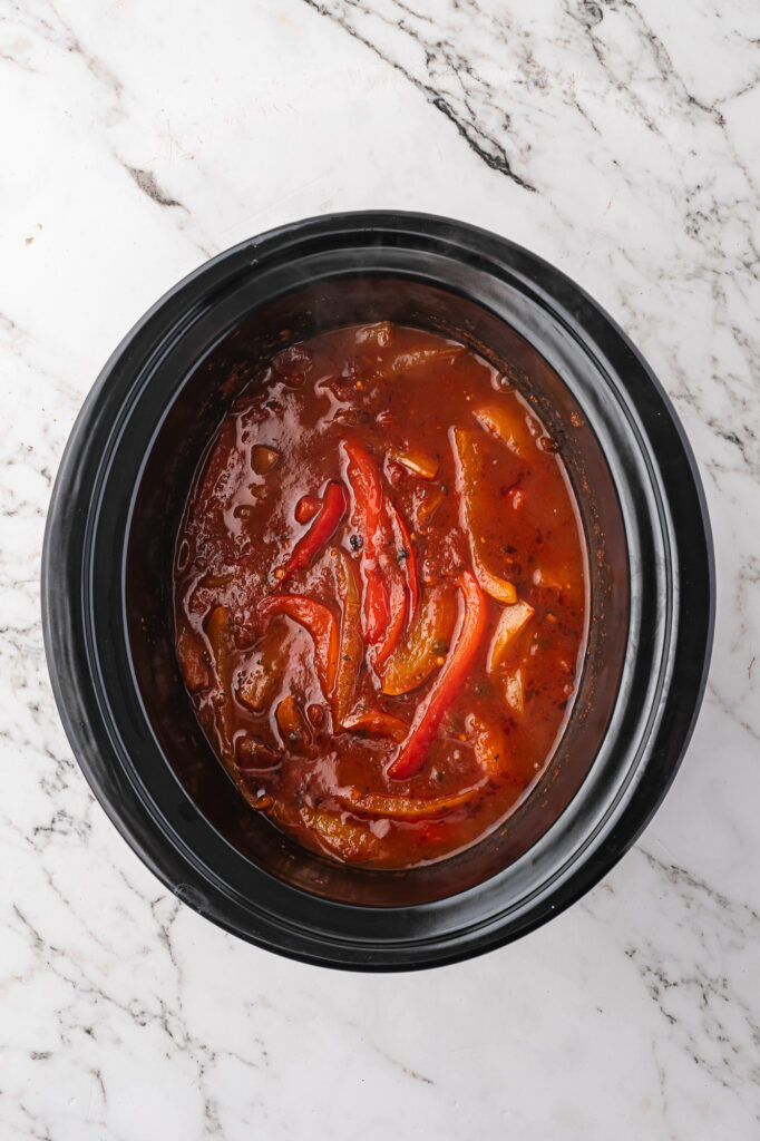 The Slow Cooker Sausage and Peppers in the slow cooker after cooking