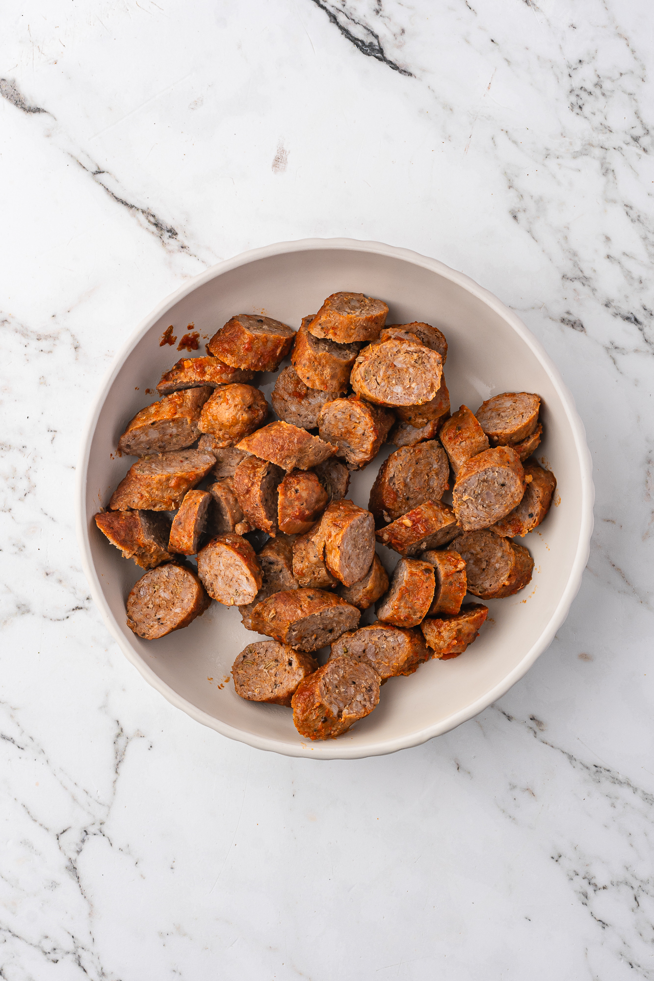 A bowl of sliced sausage