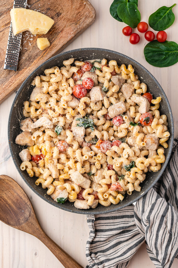 A skillet with the completed Boursin Cheese Pasta with Chicken